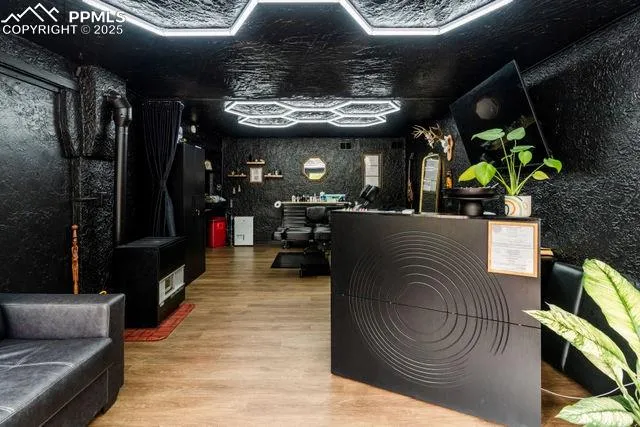 a view of balcony with furniture and a pathway