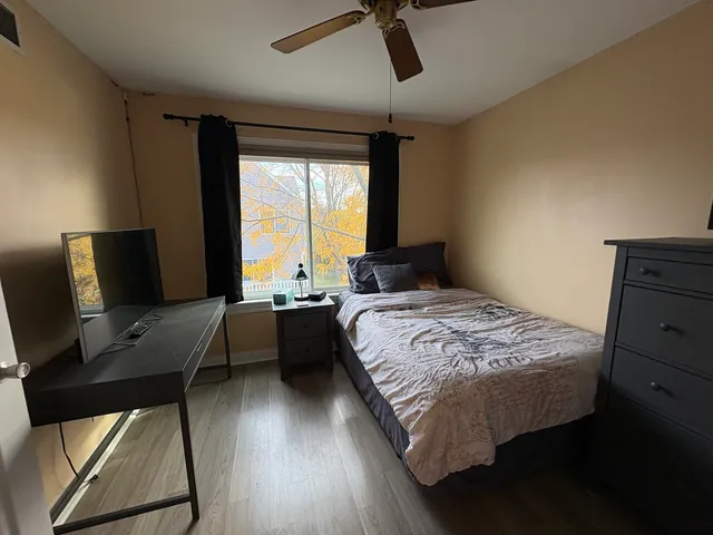 a bathroom with a sink toilet a mirror and shower