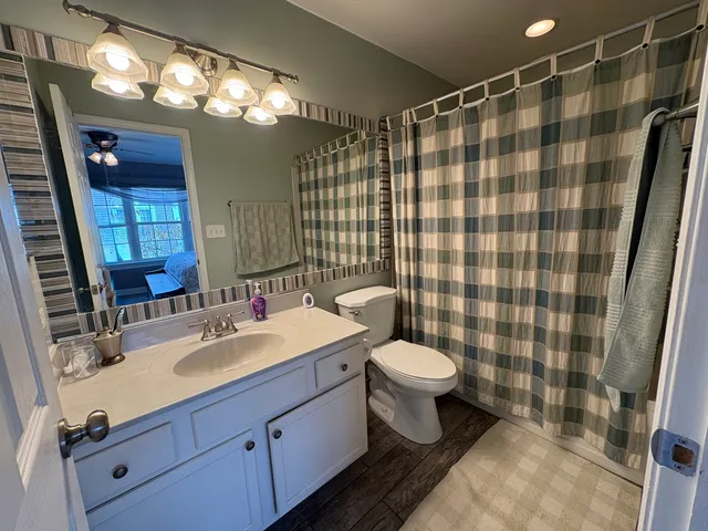 a view of workspace with furniture and window