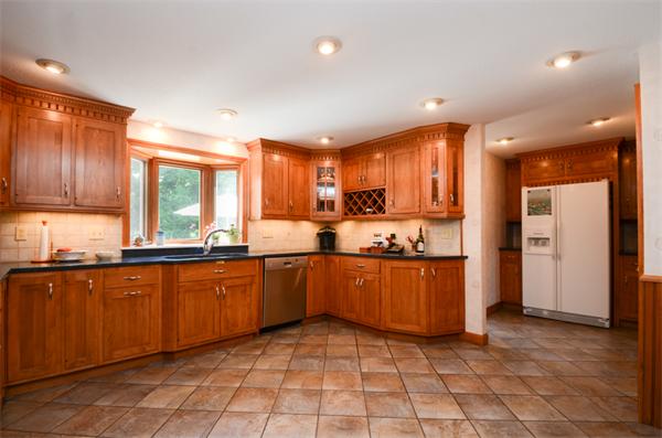 107 Viscount Road Longmeadow, MA 01106 - Photo 11 of 30 a large kitchen with stainless steel appliances granite countertop a stove a sink dishwasher and a refrigerator