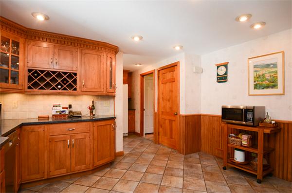 107 Viscount Road Longmeadow, MA 01106 - Photo 12 of 30 a kitchen with stainless steel appliances granite countertop a refrigerator and a stove top oven