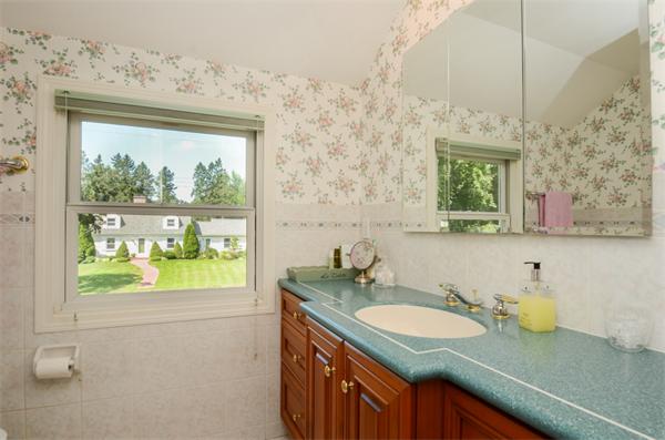 107 Viscount Road Longmeadow, MA 01106 - Photo 23 of 30 a bathroom with a granite countertop sink and a window