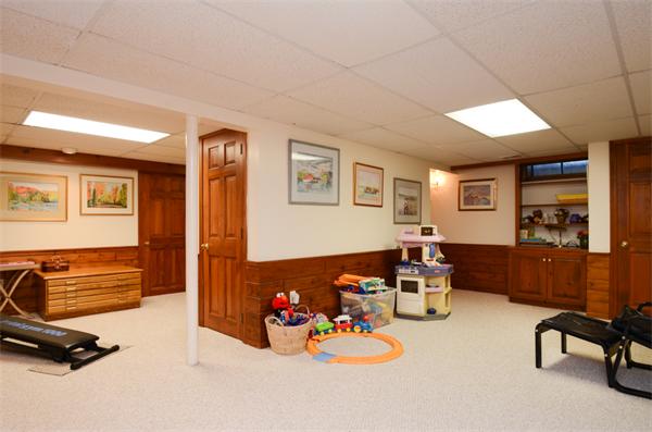 107 Viscount Road Longmeadow, MA 01106 - Photo 26 of 30 a living room with furniture gym equipment and a view of living room