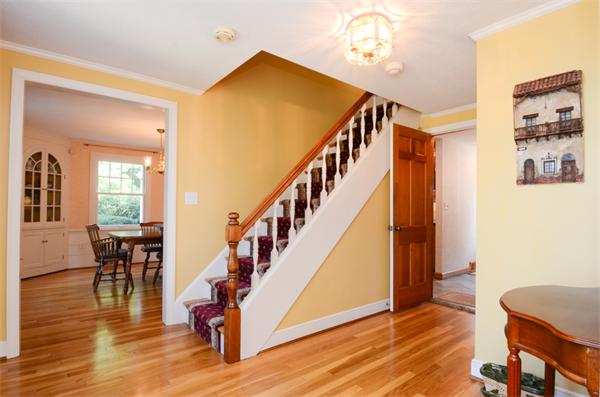 107 Viscount Road Longmeadow, MA 01106 - Photo 6 of 30 a view of entryway and dining room with wooden floor