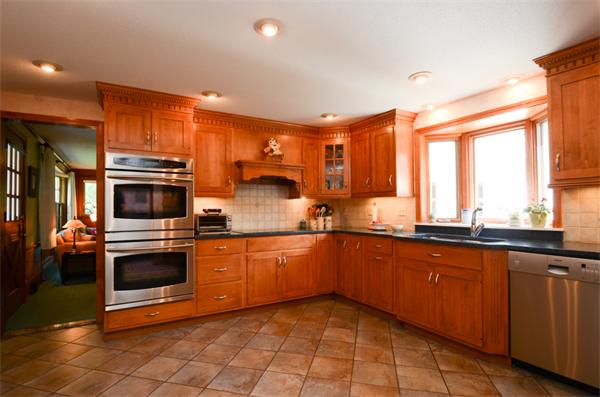 107 Viscount Road Longmeadow, MA 01106 - Photo 10 of 30 a kitchen with stainless steel appliances a stove sink and microwave