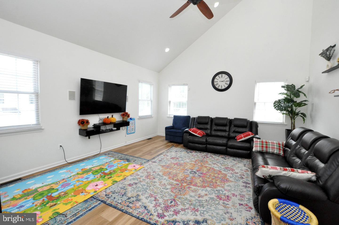 8 Jasmine Way Sewell, NJ 08080 - Photo 11 of 38 a living room with furniture and a flat screen tv