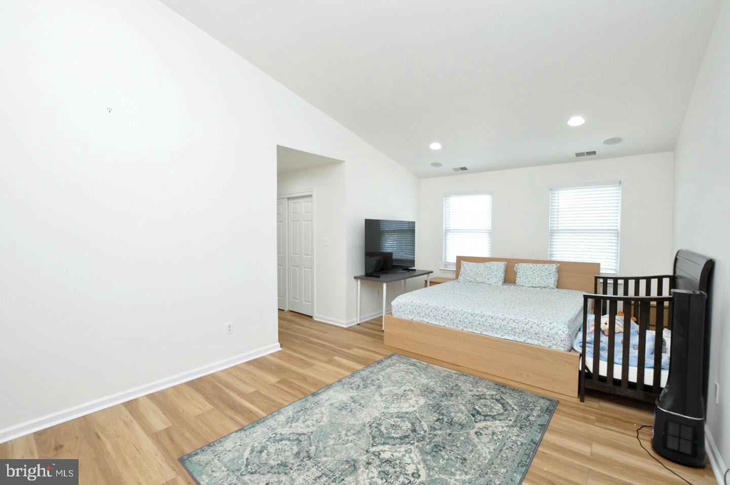 8 Jasmine Way Sewell, NJ 08080 - Photo 20 of 38 a spacious bedroom with a bed and a flat screen tv