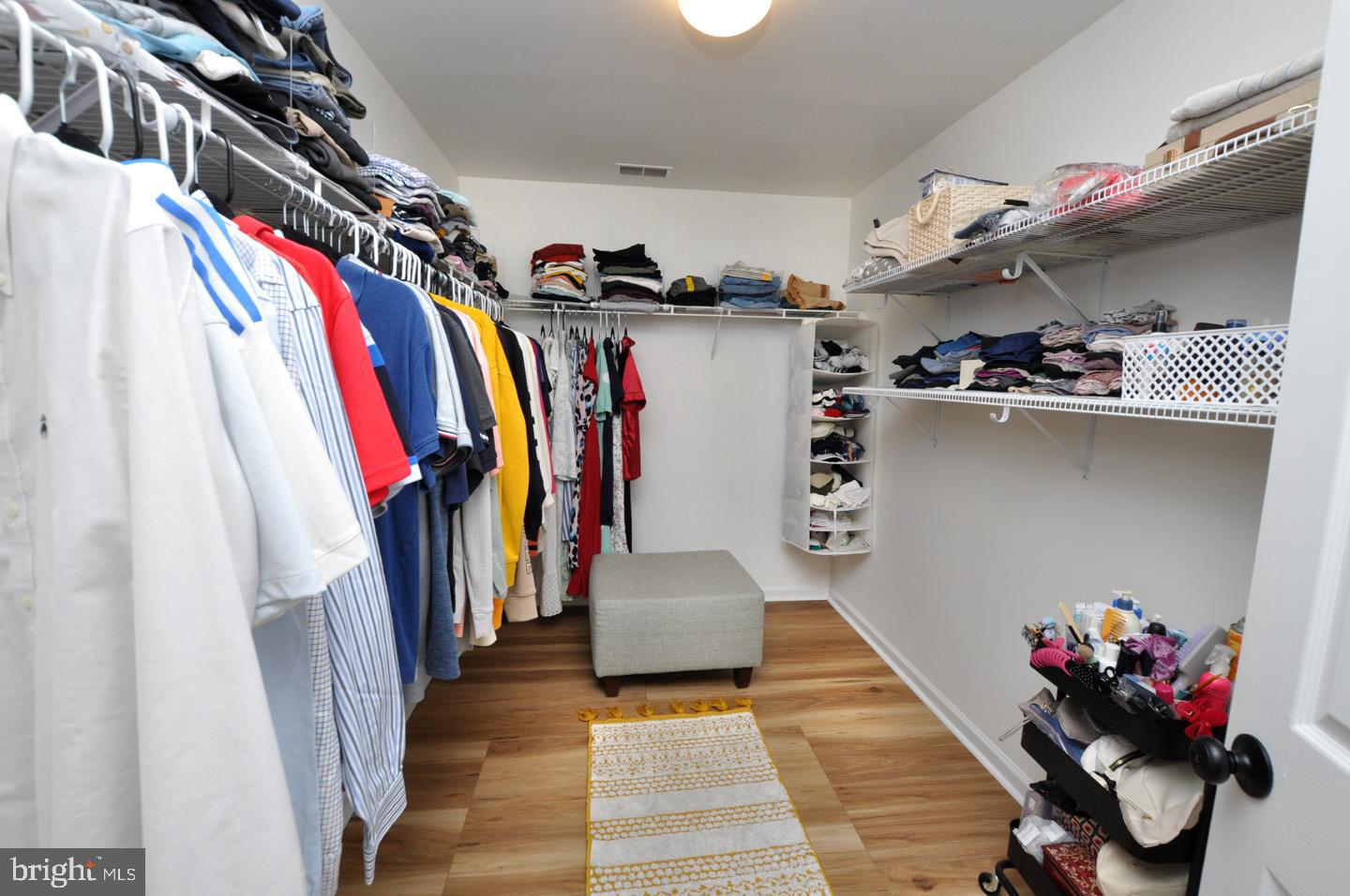 8 Jasmine Way Sewell, NJ 08080 - Photo 21 of 38 a view of walk in closet with clothes and shoes