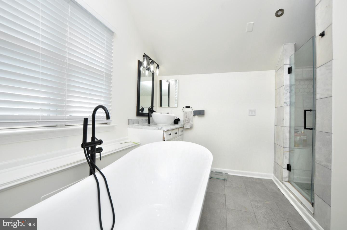 8 Jasmine Way Sewell, NJ 08080 - Photo 23 of 38 a bathroom with a sink and a mirror