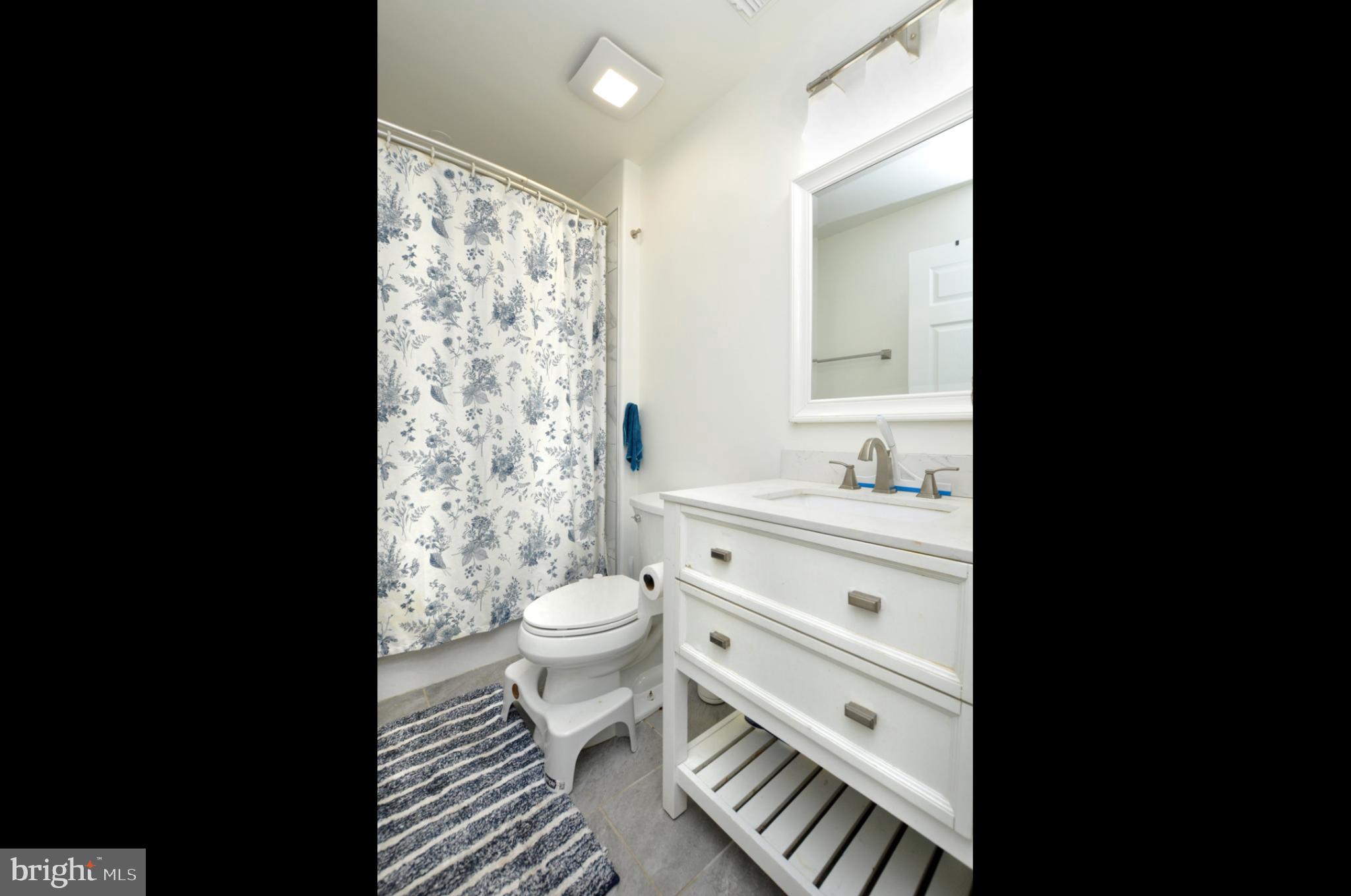 8 Jasmine Way Sewell, NJ 08080 - Photo 28 of 38 a bathroom with a granite countertop toilet sink and mirror