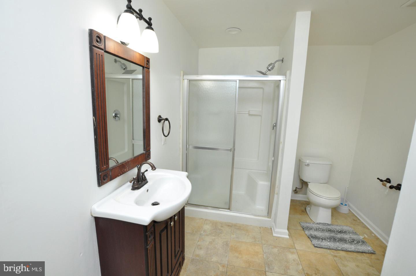 8 Jasmine Way Sewell, NJ 08080 - Photo 34 of 38 a bathroom with a sink toilet and shower