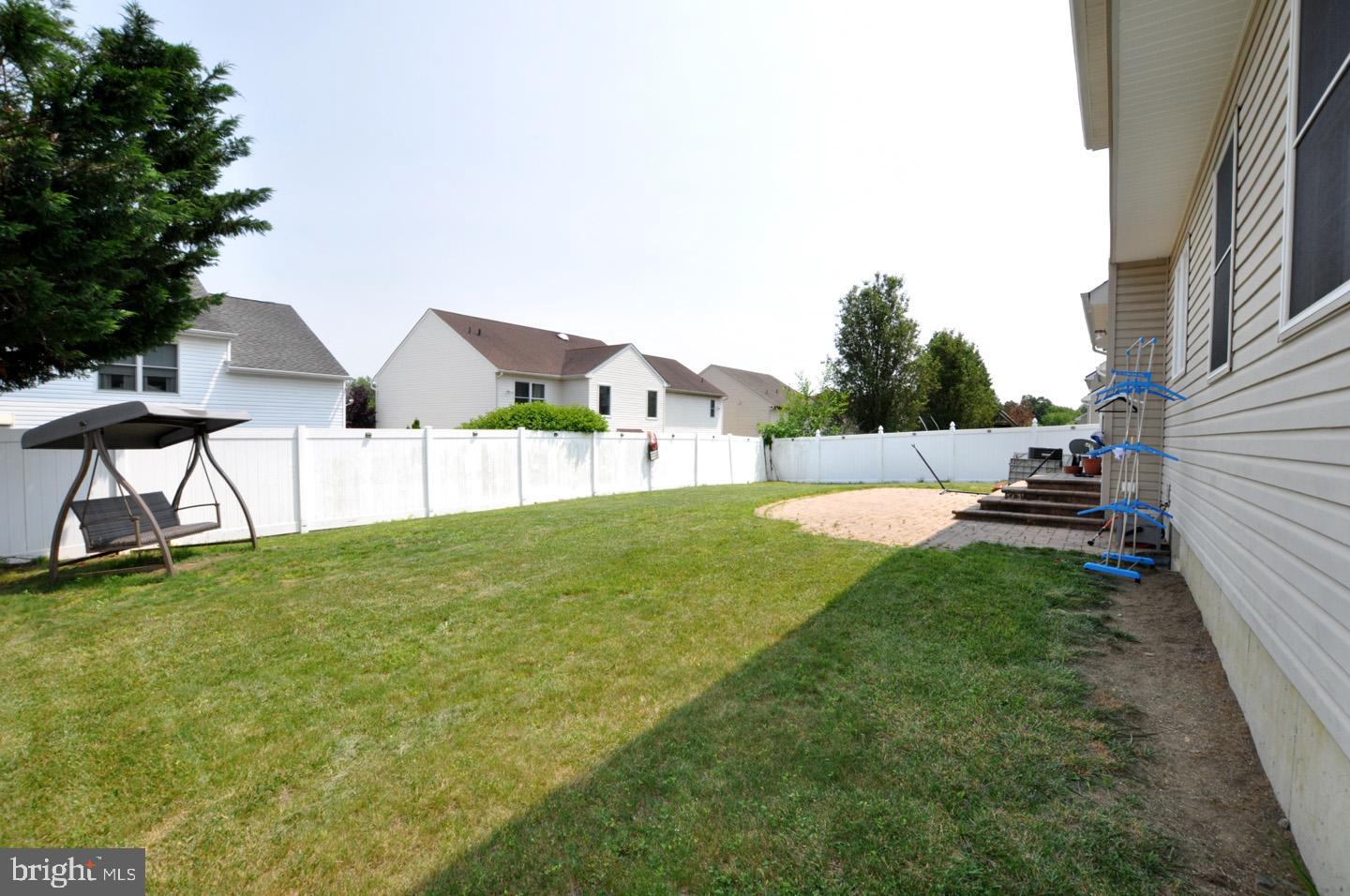 8 Jasmine Way Sewell, NJ 08080 - Photo 36 of 38 a view of an house with backyard and furniture