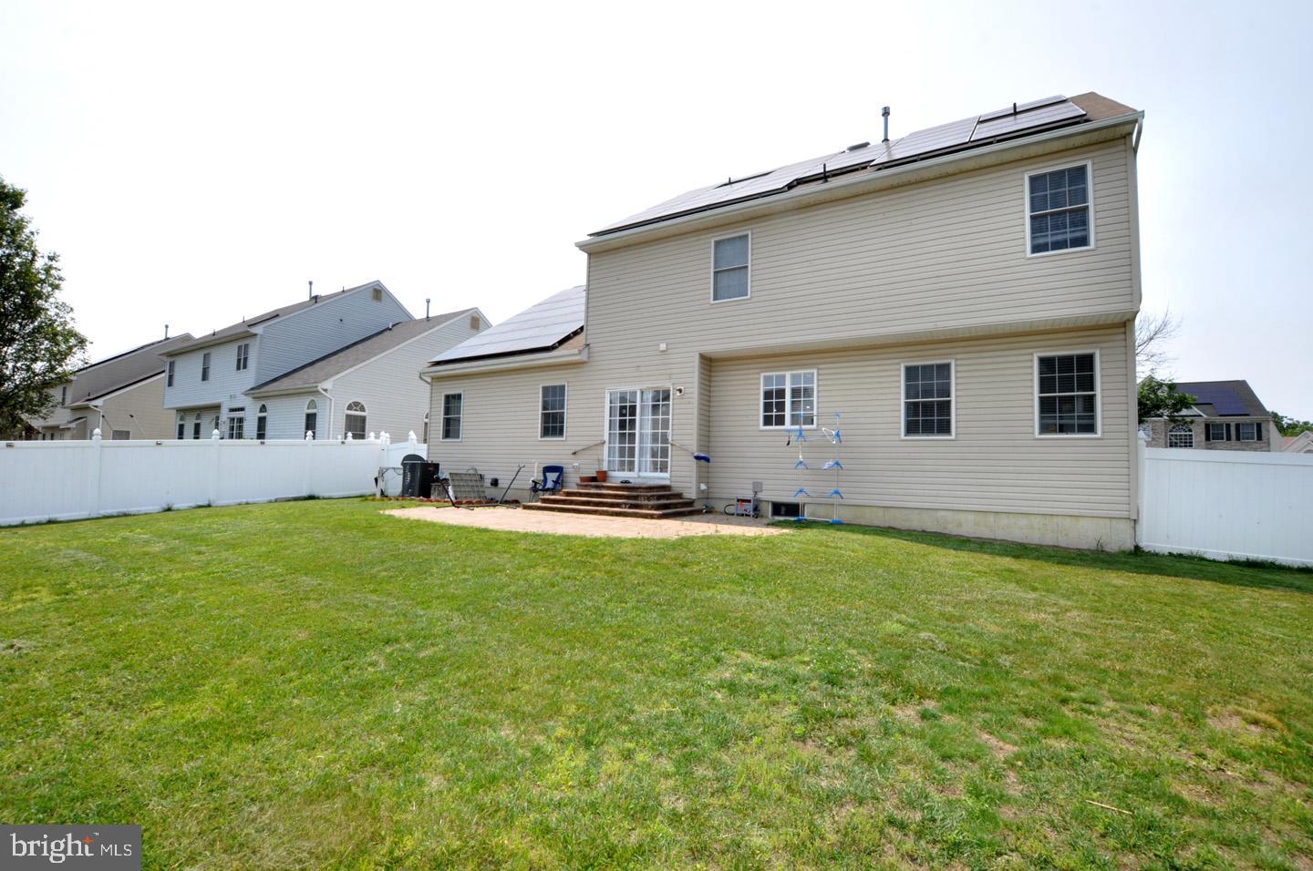 8 Jasmine Way Sewell, NJ 08080 - Photo 37 of 38 a view of a house with backyard and sitting area