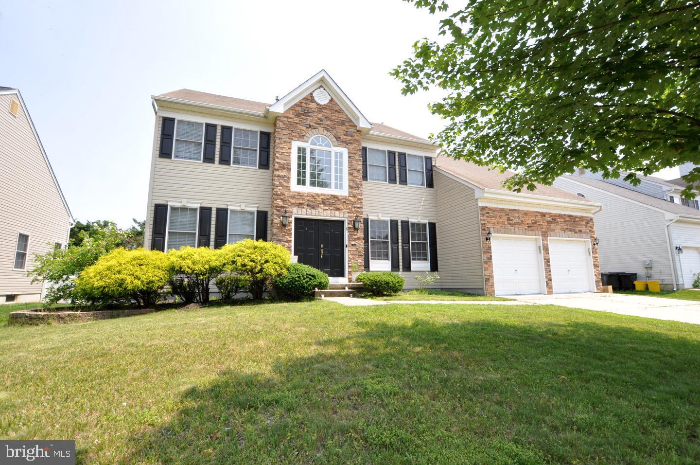 8 Jasmine Way Sewell, NJ 08080 - Photo 38 of 38 a house view with a sitting space and garden