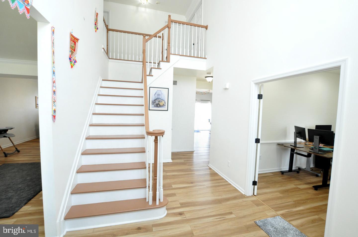 8 Jasmine Way Sewell, NJ 08080 - Photo 4 of 38 a view of entryway and hall with wooden floor