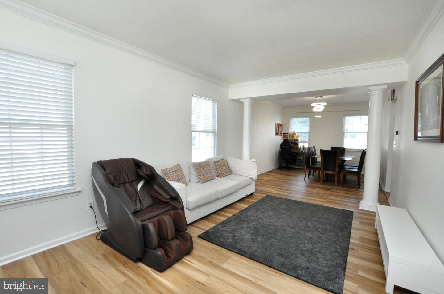 8 Jasmine Way Sewell, NJ 08080 - Photo 7 of 38 a living room with furniture and a wooden floor