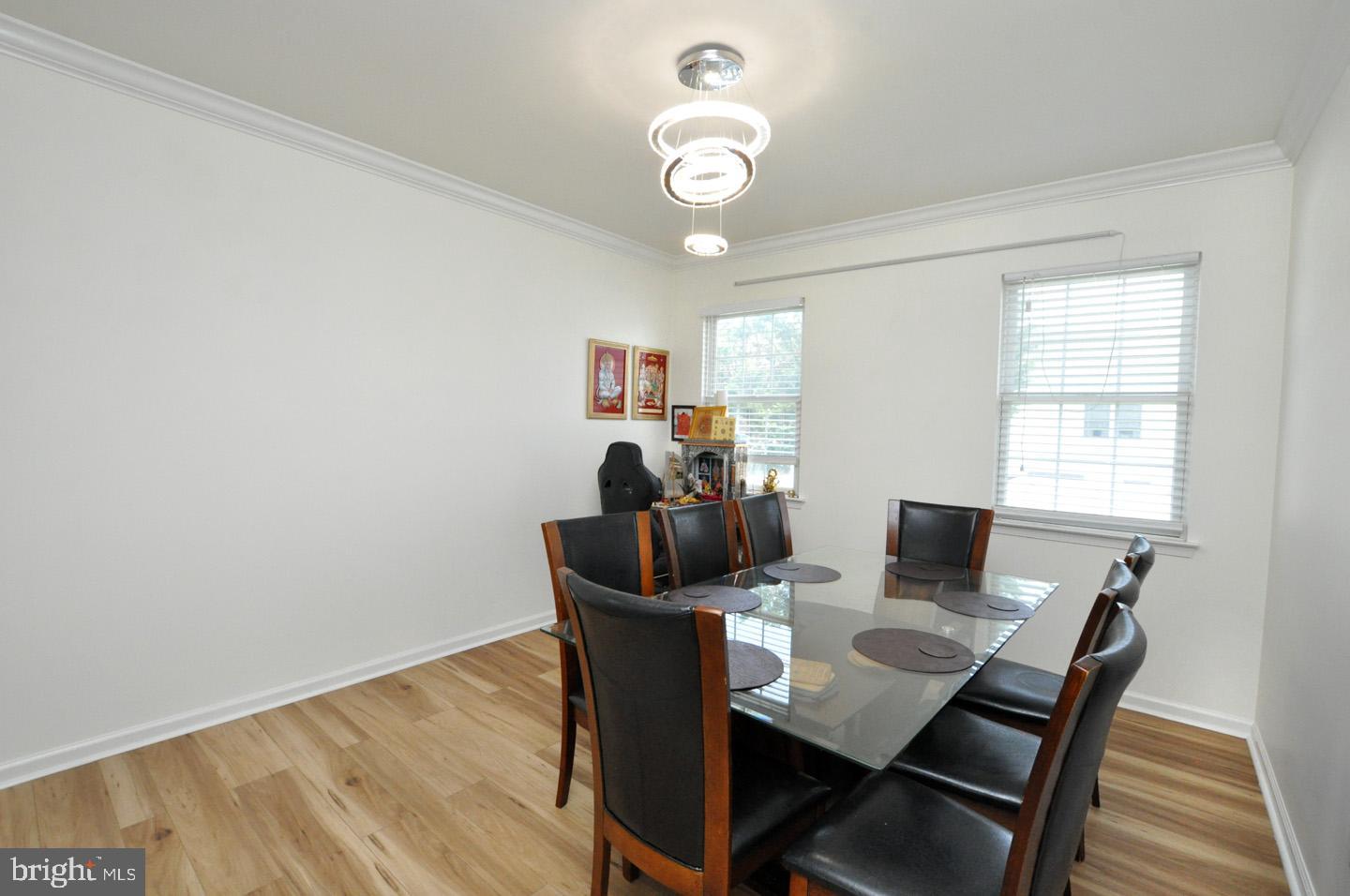 8 Jasmine Way Sewell, NJ 08080 - Photo 9 of 38 a view of a dining room with furniture and wooden floor