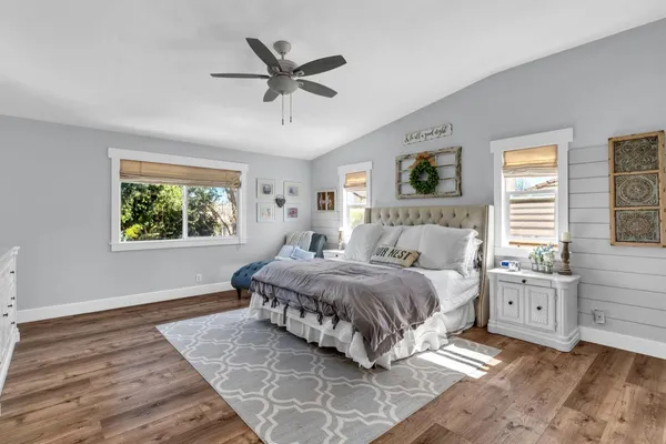 a bathroom with a sink double vanity and a mirror