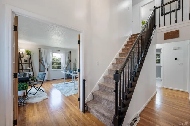 a view of a bathroom with a shower curtain