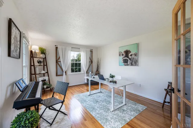 a bathroom with a sink a vanity and a mirror