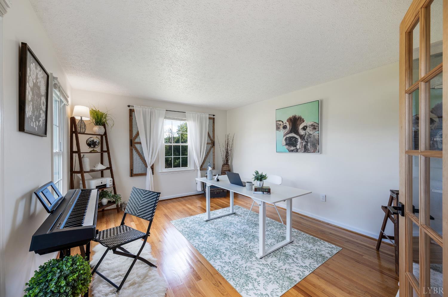1199 Great Oak Road Forest, VA 24551 - Photo 13 of 85 a living room with furniture and a wooden floor