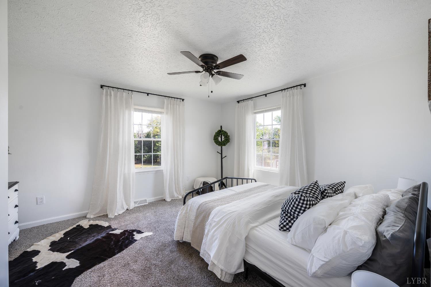 1199 Great Oak Road Forest, VA 24551 - Photo 19 of 85 a bedroom with a bed and window