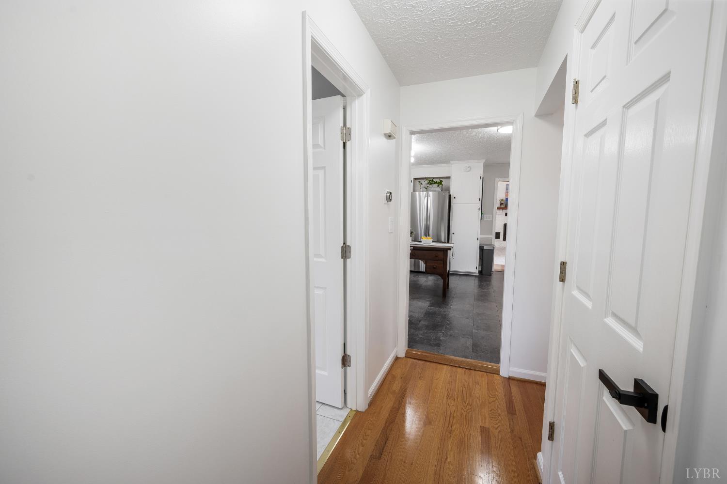1199 Great Oak Road Forest, VA 24551 - Photo 20 of 85 a view of a hallway with wooden floor and closet