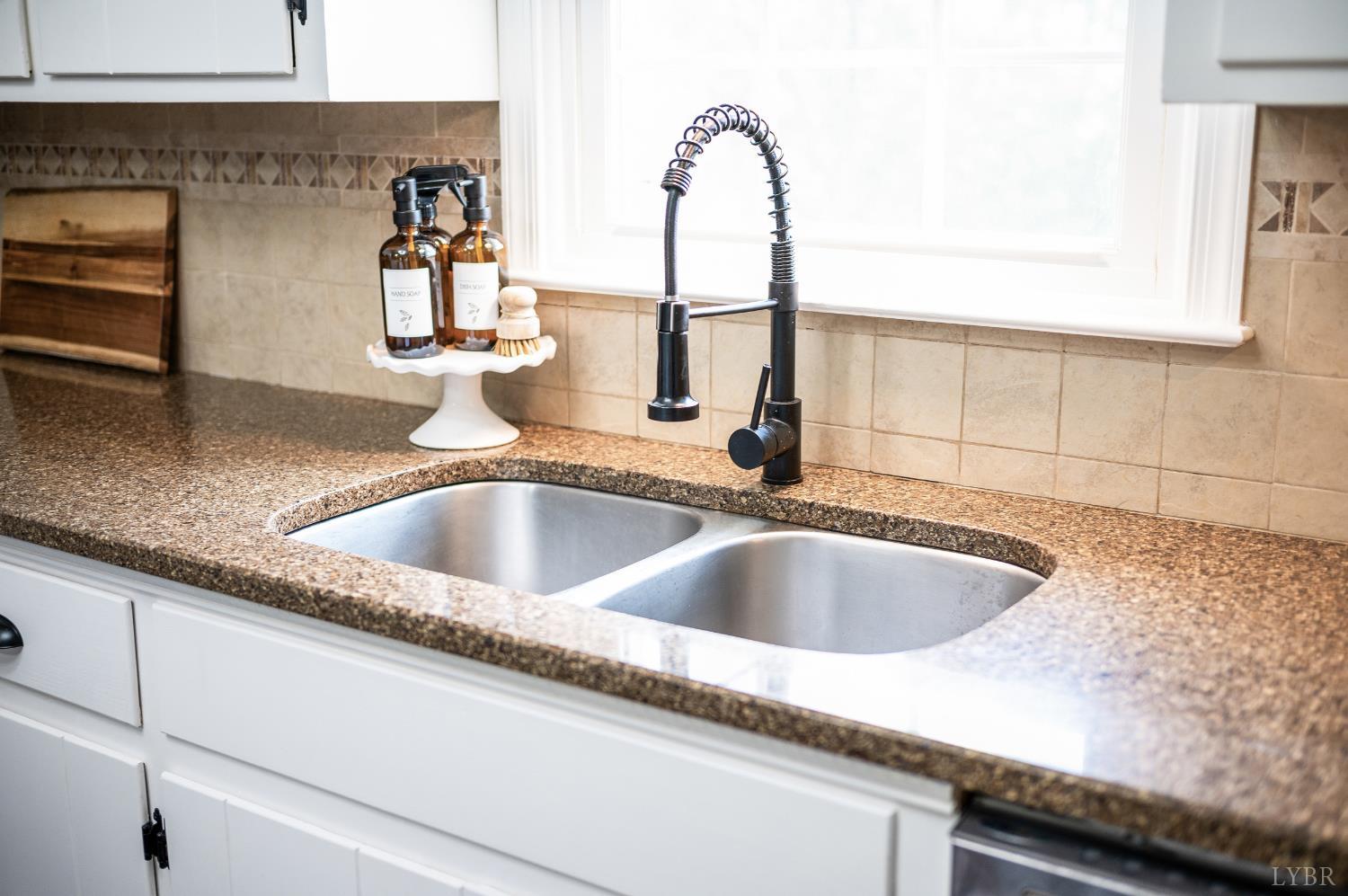 1199 Great Oak Road Forest, VA 24551 - Photo 25 of 85 a close view of sink and tap