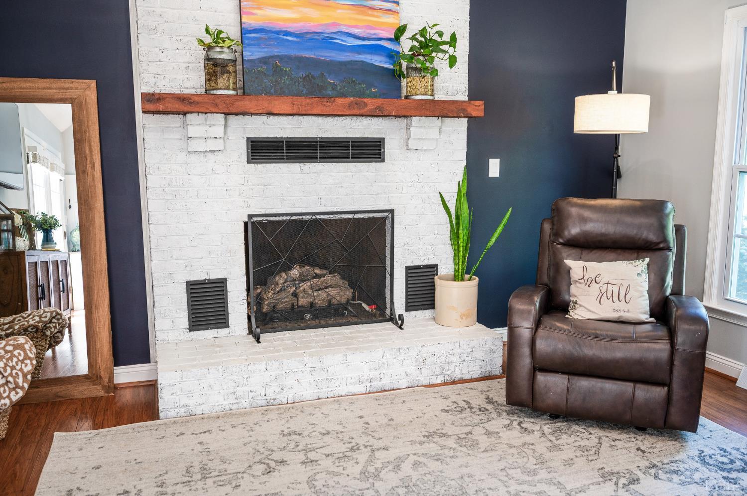 1199 Great Oak Road Forest, VA 24551 - Photo 29 of 85 a living room with furniture and a fireplace