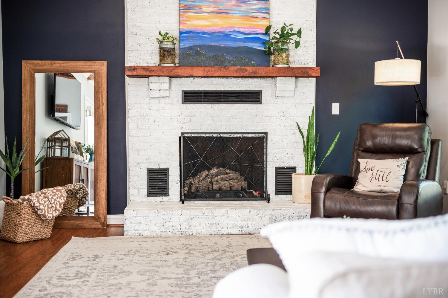 1199 Great Oak Road Forest, VA 24551 - Photo 33 of 85 a living room with furniture and a fireplace