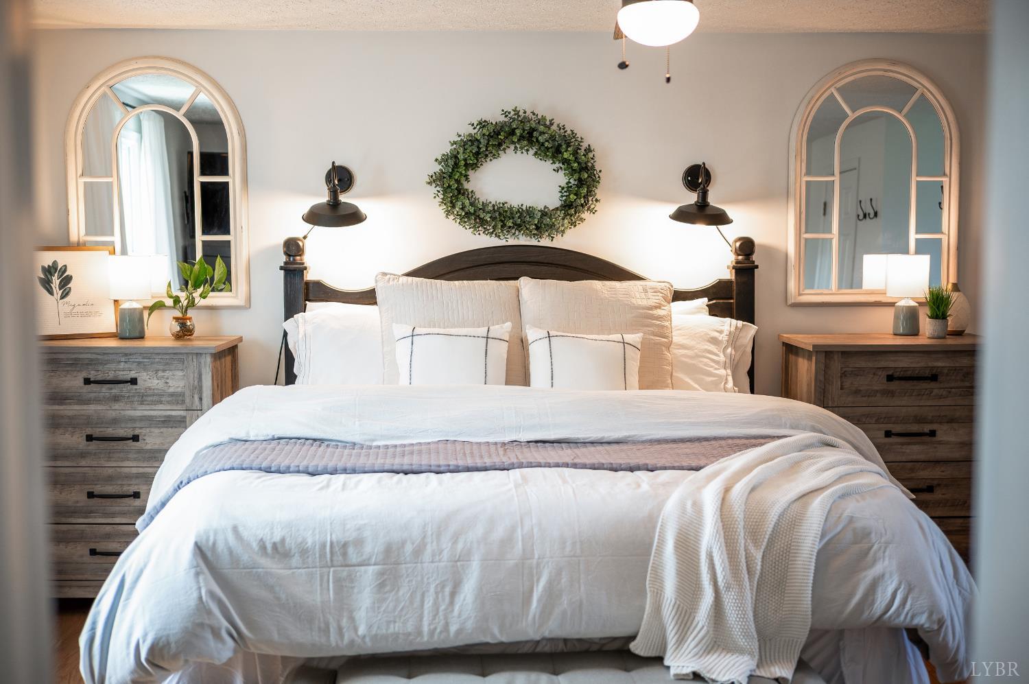 1199 Great Oak Road Forest, VA 24551 - Photo 38 of 85 a bedroom with a bed and a chandelier