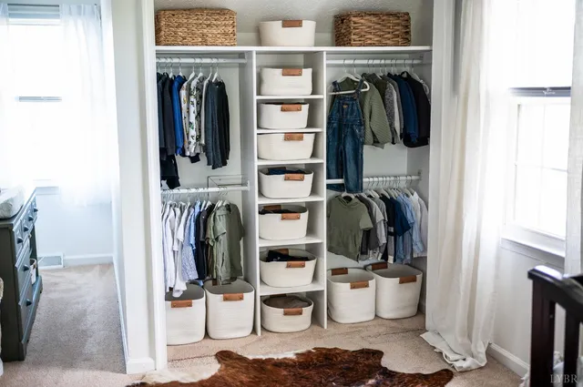 an aerial view of a house with a lake view