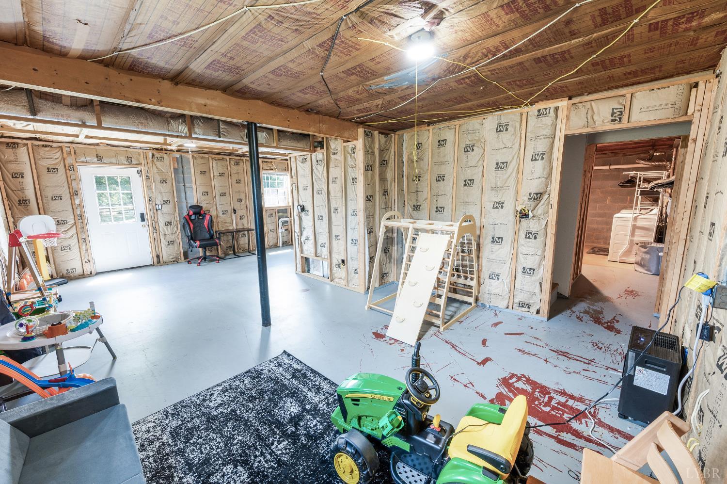 1199 Great Oak Road Forest, VA 24551 - Photo 48 of 85 a view of a room with furniture and floor to ceiling window