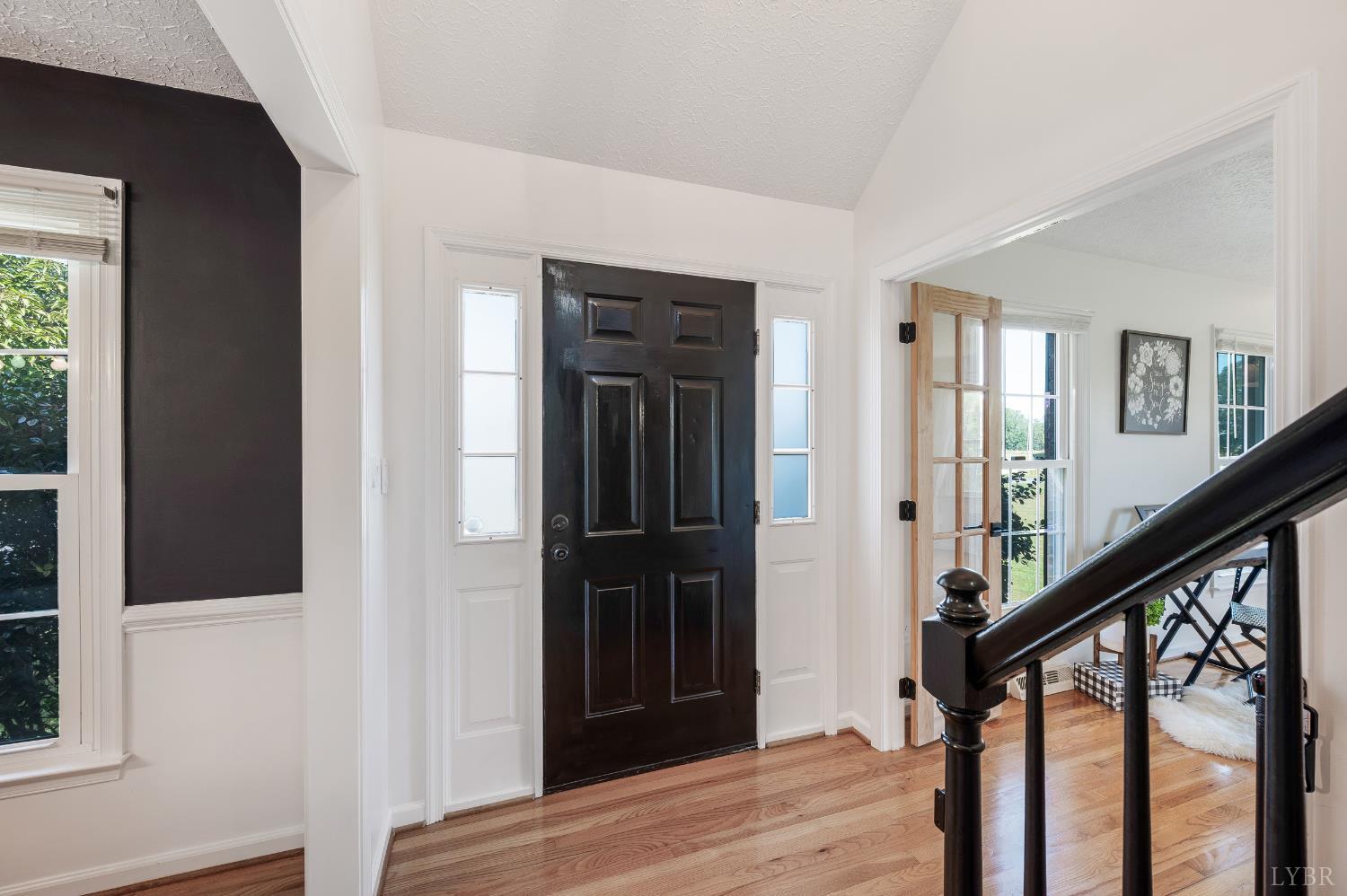 1199 Great Oak Road Forest, VA 24551 - Photo 6 of 85 a view of a hallway with wooden floor and stairs
