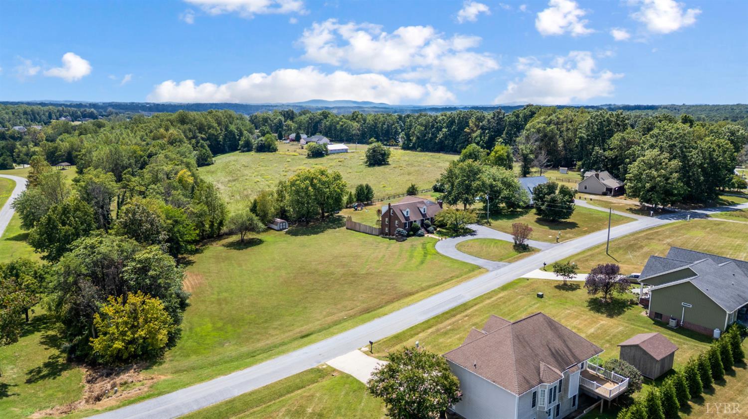 1199 Great Oak Road Forest, VA 24551 - Photo 70 of 85 a view of a swimming pool with a patio and a yard