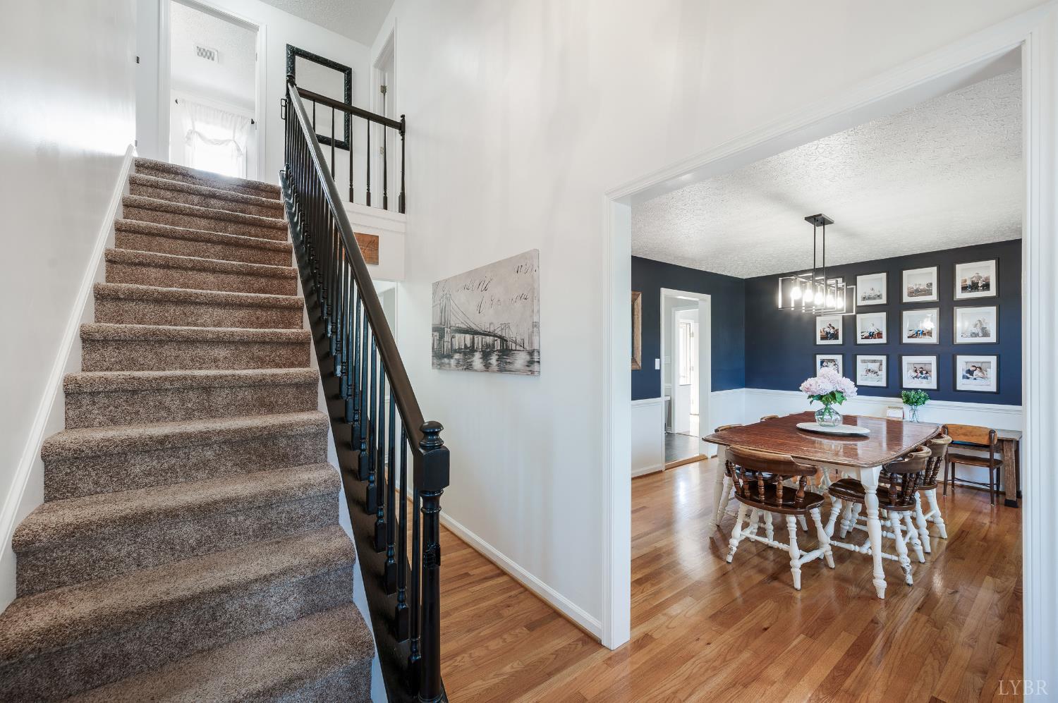 1199 Great Oak Road Forest, VA 24551 - Photo 7 of 85 a view of a dining room with furniture and wooden floor