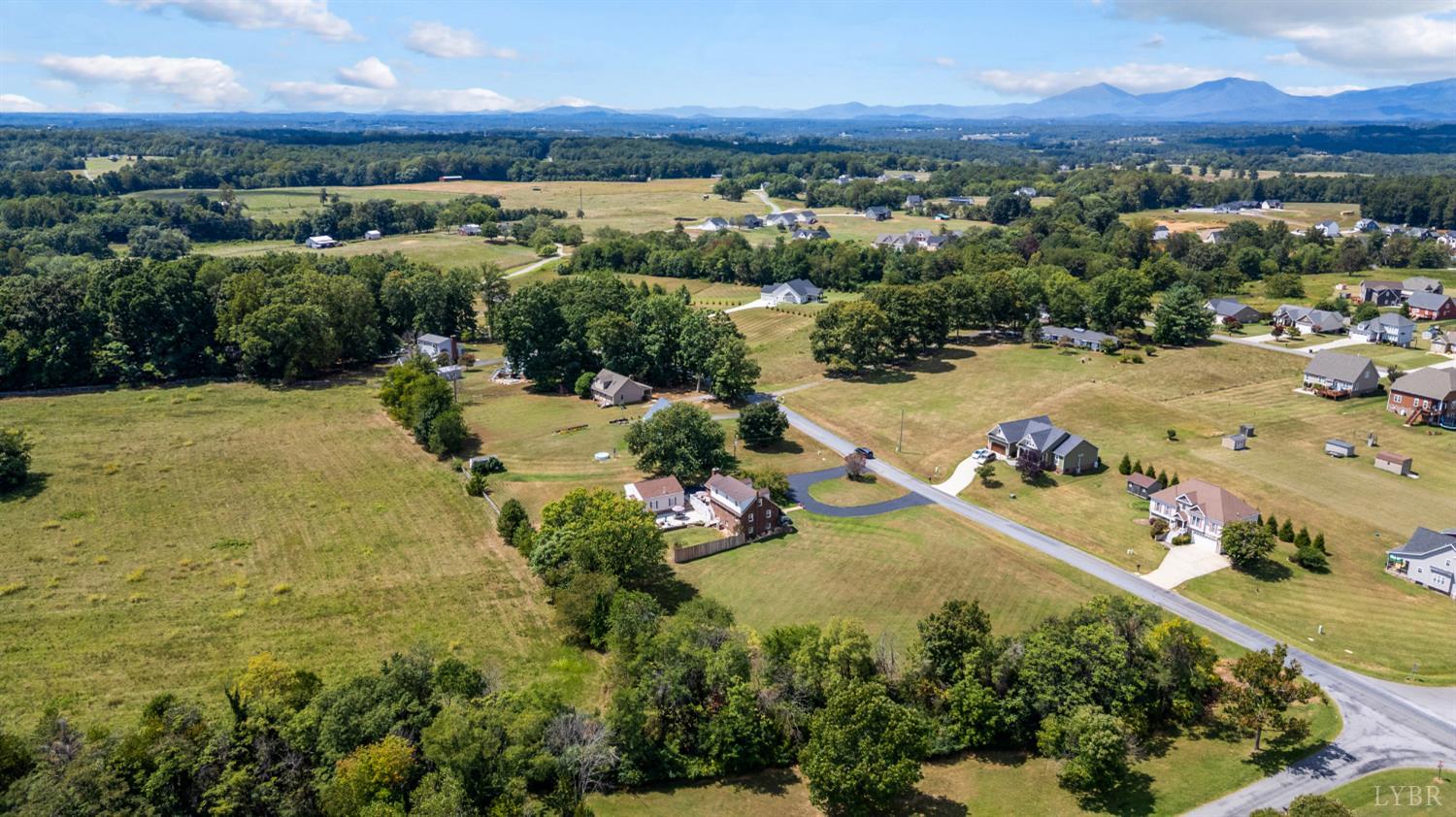 1199 Great Oak Road Forest, VA 24551 - Photo 78 of 85 an aerial view of a houses with a lake view