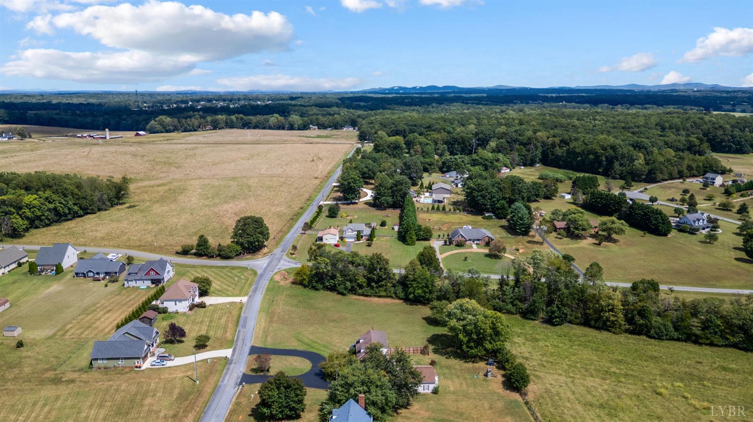 1199 Great Oak Road Forest, VA 24551 - Photo 79 of 85 an aerial view of a house with a lake view