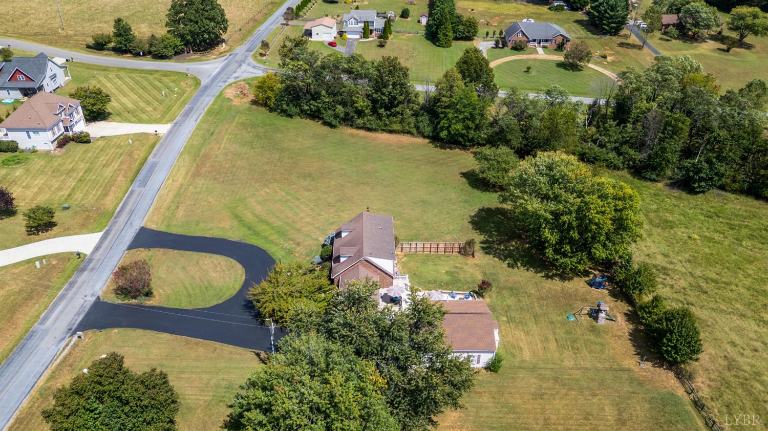 1199 Great Oak Road Forest, VA 24551 - Photo 80 of 85 an aerial view of a house with a yard and lake view