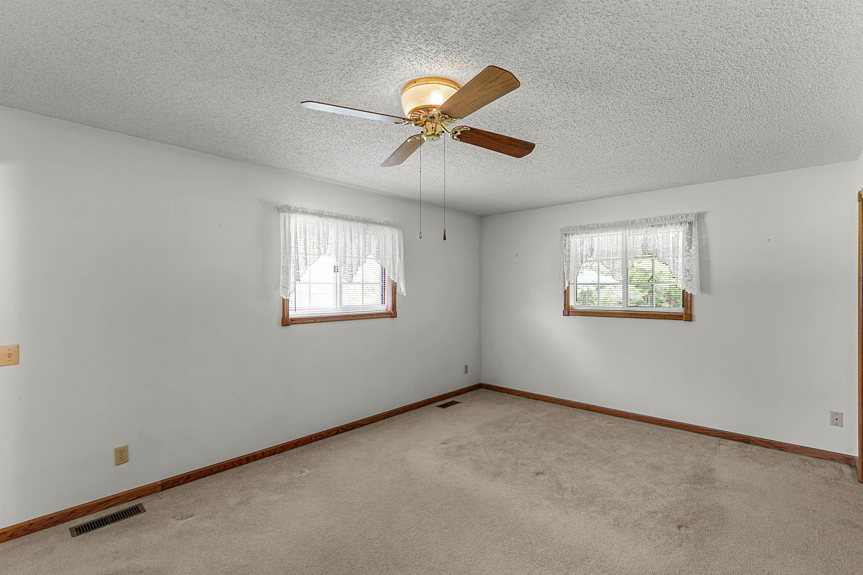 780 Griggs Chapel Road Cedar Grove, TN 38321 - Photo 14 of 25 a view of a big room with carpet