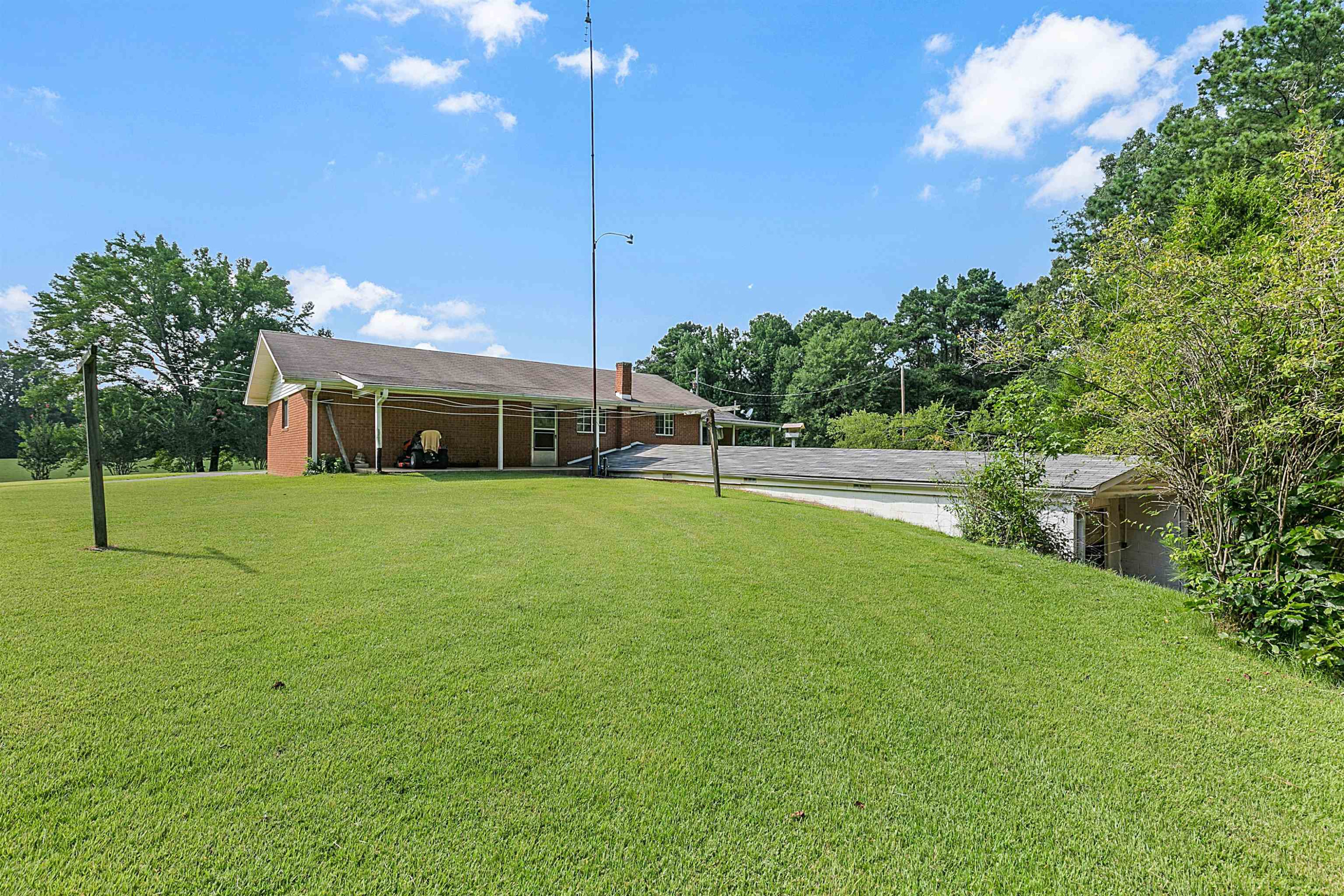 780 Griggs Chapel Road Cedar Grove, TN 38321 - Photo 3 of 25 a view of house with a backyard