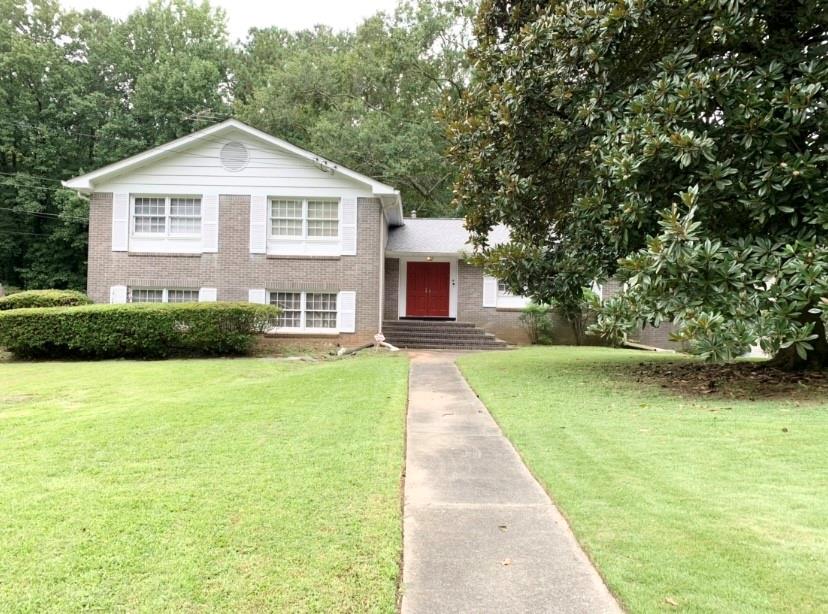 2868 Alameda Trail Decatur, GA 30034 - Photo 1 of 1 a front view of a house with a yard and trees