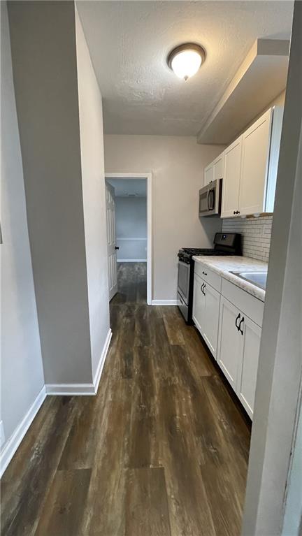 362 Navigation Street Beaver, PA 15009 - Photo 4 of 10 a spacious bathroom with a sink and a mirror