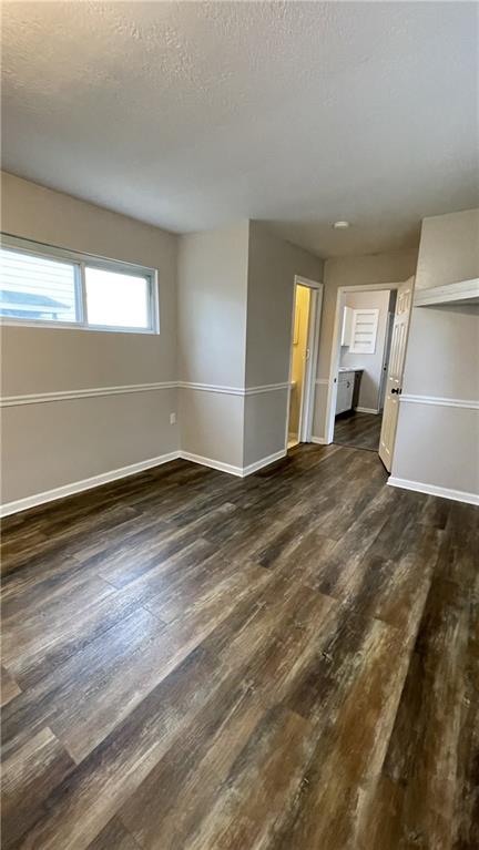 362 Navigation Street Beaver, PA 15009 - Photo 5 of 10 an empty room with wooden floor and windows