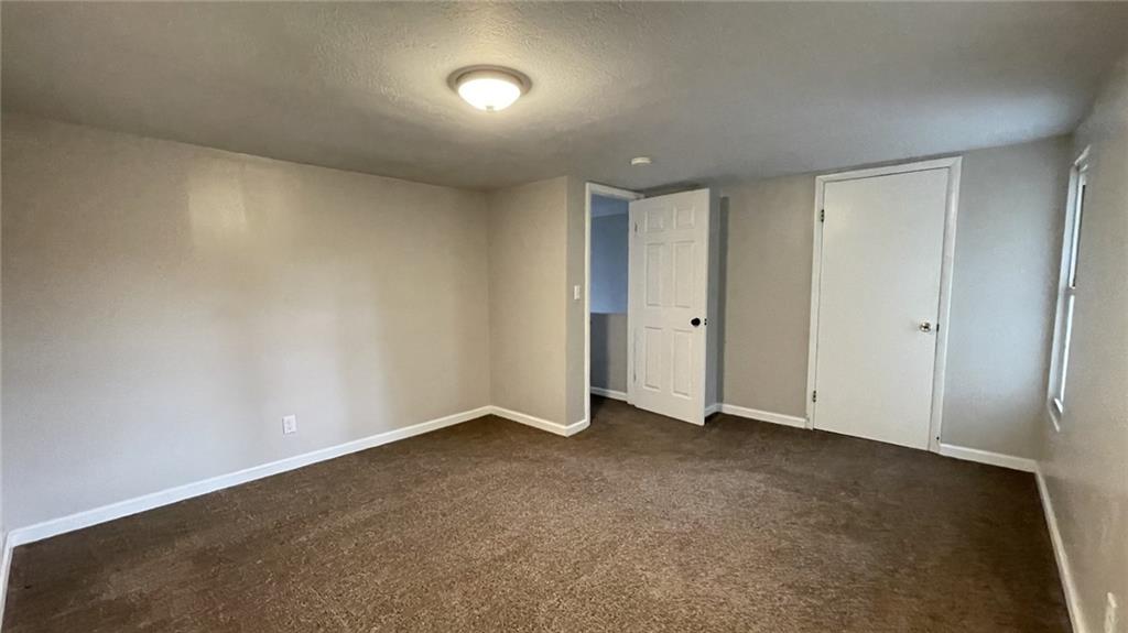 362 Navigation Street Beaver, PA 15009 - Photo 7 of 10 an empty room with an entryway