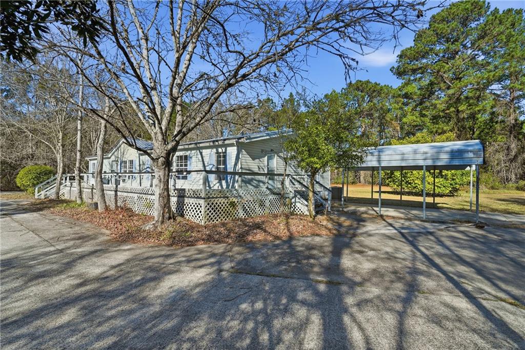 1265 Barfield Road Southwest Townsend, GA 31331 - Photo 3 of 30 a view of backyard with trees