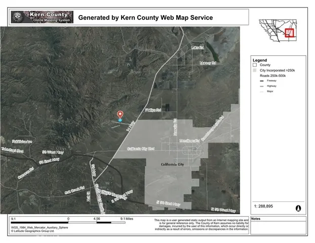 a black and white photo of a black white building