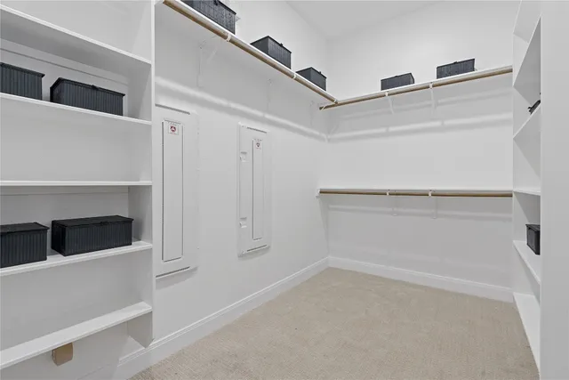 a very nice looking dining room with a large mirror