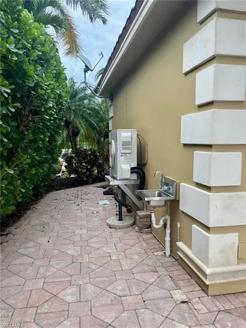 a bedroom with a bed and a chair