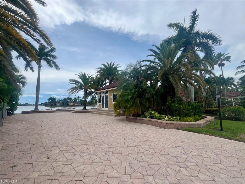 4931 Coach Lane Naples, FL 34114 - Photo 3 of 13 a view of a backyard